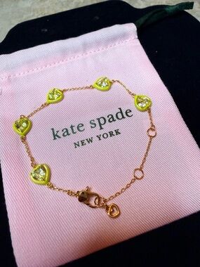 kate spade gold-tone bracelet with neon yellow heart crystals